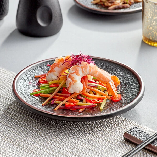 Acopa Heika 7 11/16" Black Matte Textured Coupe Stoneware Plate - Sample