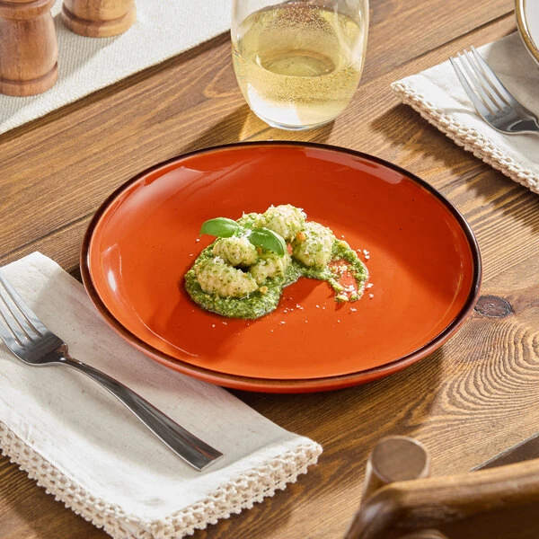 Acopa Keystone 8 1/2" Sedona Orange Porcelain Coupe Plate - Sample
