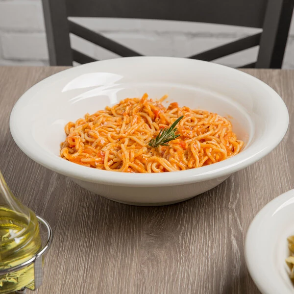Tuxton BEB-800C 76 oz. Eggshell China Pasta Bowl - 6/Case