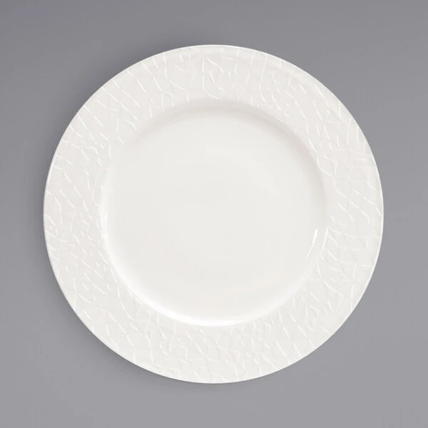 Front of the House Catalyst 10 5/8" European White Geometric Embossed Wide Rim Round Porcelain Plate - 6/Case