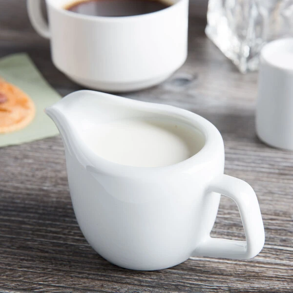 Tuxton GZP-101 TuxTrendz 6 oz. Porcelain White China Creamer - 12/Case