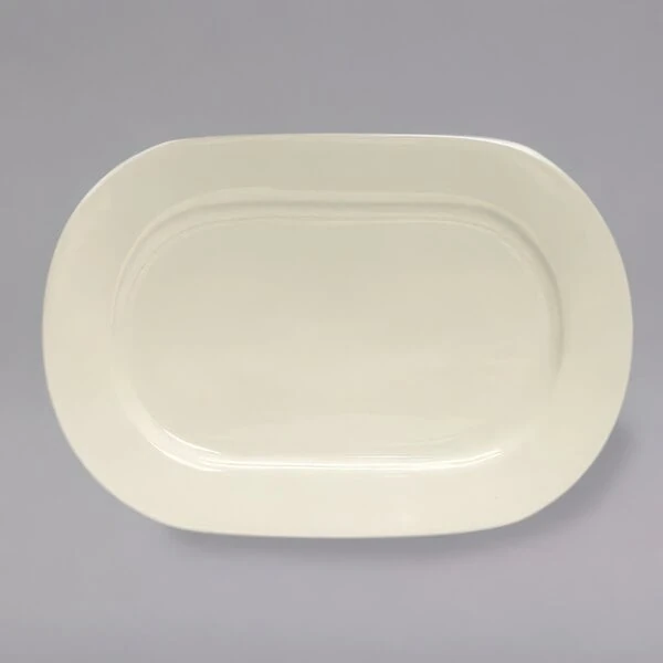 Tuxton BEH-150D Daytona 15" x 10 3/4" Eggshell Oval China Platter - 6/Case