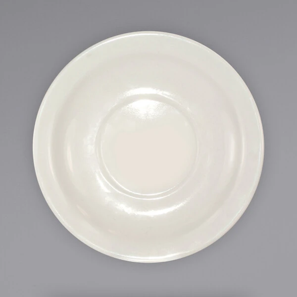 International Tableware Valencia 5 1/2" Ivory (American White) Narrow Rim Rolled Edge Saucer - 36/Case