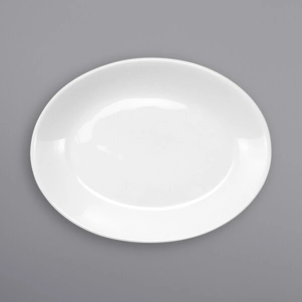 International Tableware Torino 9 5/8" x 7 1/2" Oval European White Coupe Porcelain Platter - 12/Case