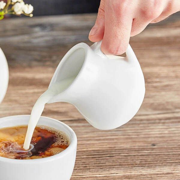 Acopa 3.5 oz. Bright White Porcelain Creamer - 48/Case