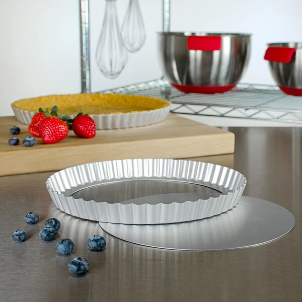 Fat Daddio's PFT-95 ProSeries 9 1/2" x 1" Round Anodized Aluminum Fluted Tart / Quiche Pan with Removable Bottom