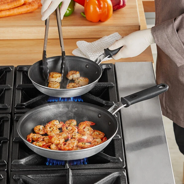 Vollrath Wear-Ever 2-Piece Aluminum Non-Stick Fry Pan Set with SteelCoat x3 Coating and Black Silicone Handles - 8" and 10" Frying Pans