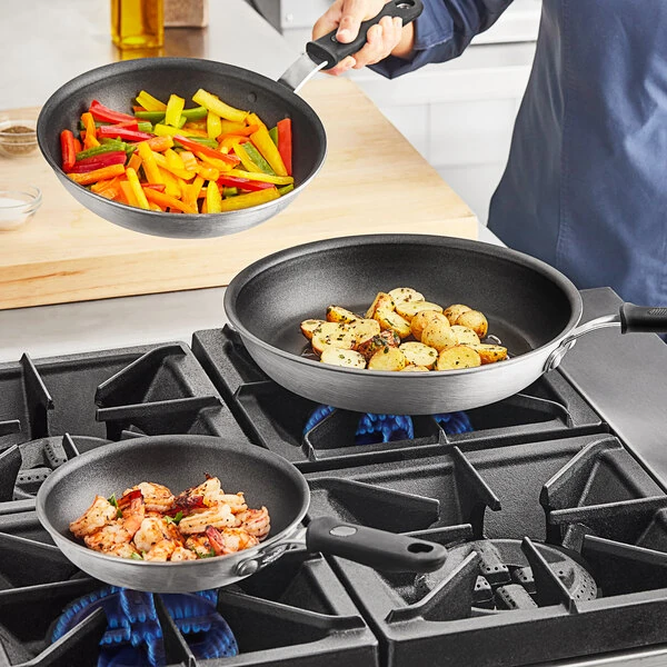 Vollrath Wear-Ever 3-Piece Aluminum Non-Stick Fry Pan Set with Rivetless Interior, CeramiGuard II Coating, and Black Silicone Handles - 8", 10", and 12" Frying Pans