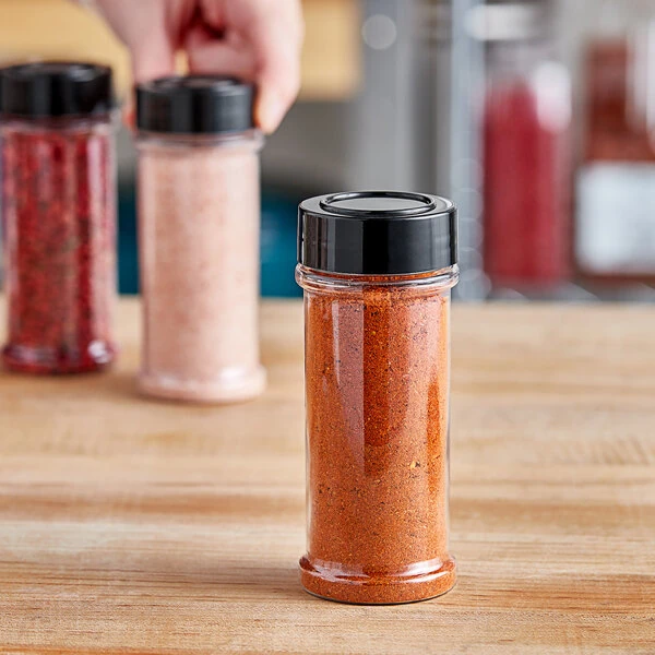 5.5 oz. Round Plastic Spice Container and 48/485 Smooth Black Unlined Lid - 350/Case
