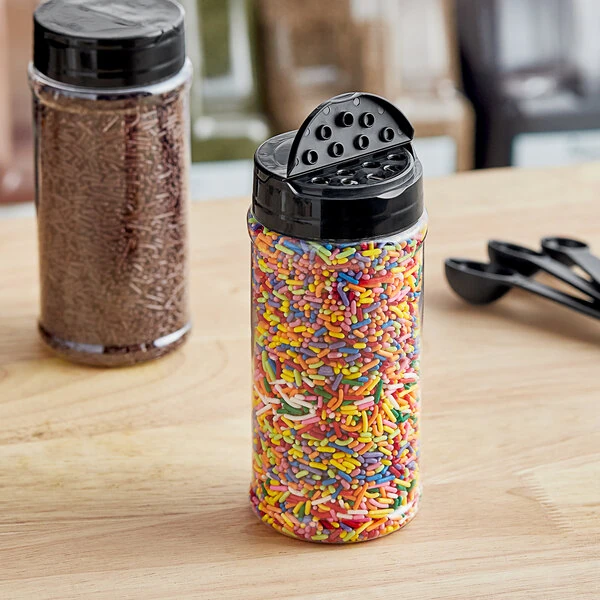 16 oz. Round Plastic Spice Container and 63/485 Black Induction-Lined Dual Flapper Lid with 7 Holes - 192/Case