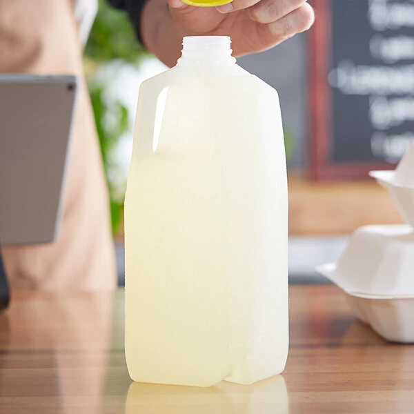 1/2 Gallon (64 oz.) Translucent HDPE Milk Jug with Handle - 108/Case