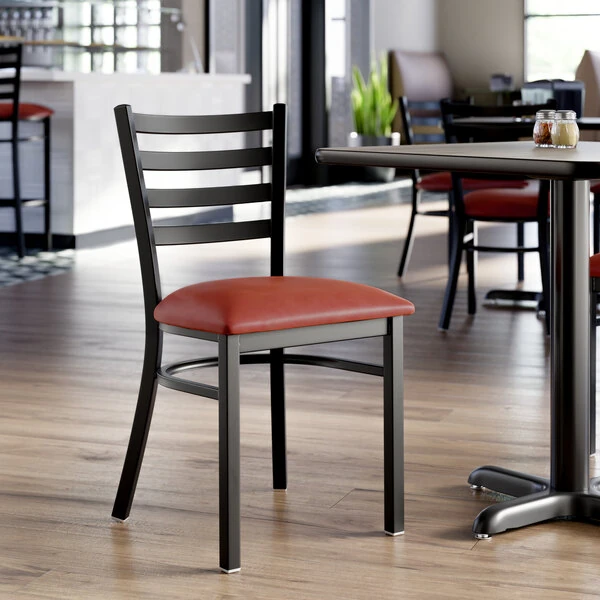 Lancaster Table & Seating Black Finish Ladder Back Chair with 2 1/2" Burgundy Vinyl Padded Seat - Detached Seat