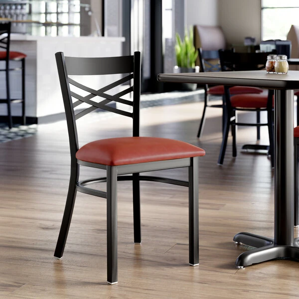 Lancaster Table & Seating Black Finish Cross Back Chair with 2 1/2" Burgundy Vinyl Padded Seat - Detached Seat