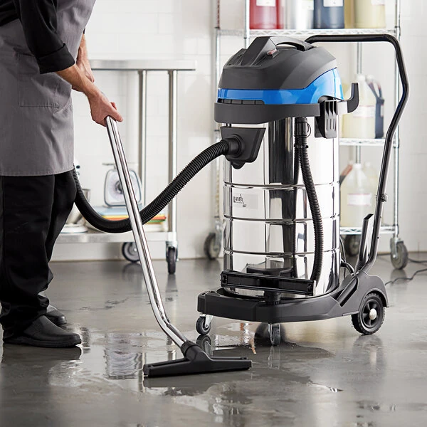 Lavex 26 Gallon Stainless Steel Commercial Wet / Dry Vacuum with Toolkit - 100-120V, 1400W