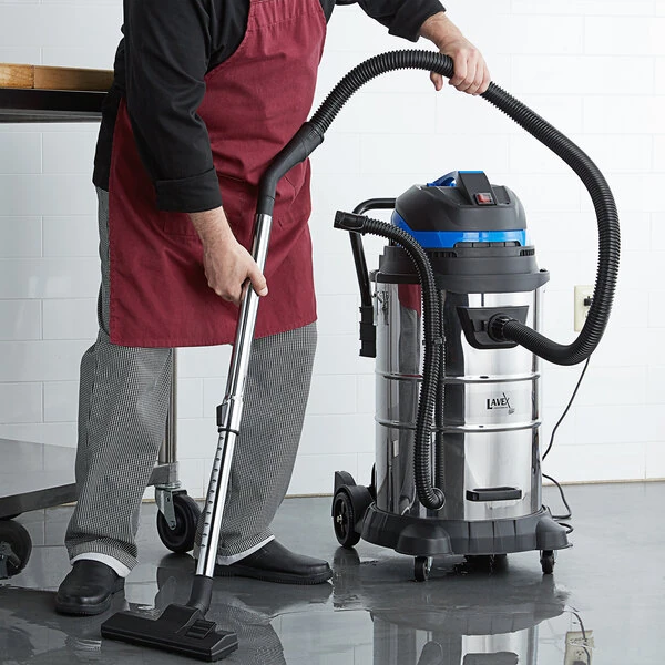 Lavex 13 Gallon Stainless Steel Commercial Wet / Dry Vacuum with Toolkit - 100-120V, 1200W