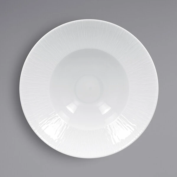 RAK Porcelain Soul 16.25 oz. Bright White Embossed Wide Rim Extra Deep Round Porcelain Plate - 6/Case