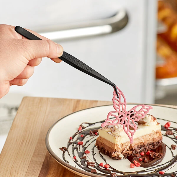 Mercer Culinary M35244BK Precision Plus 6 1/8" Black Fine Point Curved Tip Plating Tongs