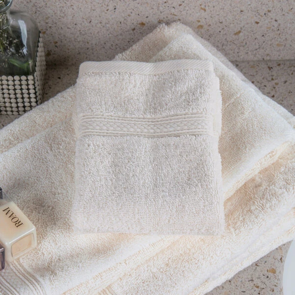 Oxford Vicenza Avorio 13" x 13" 100% Ringspun Combed Cotton Wash Cloth with Dobby Border 1.8 lb. - 288/Case