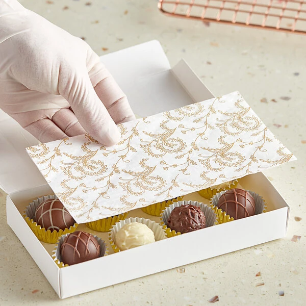Simplex 7 3/8" x 3 7/8" Glassine 3-Ply 1/2 lb. White Candy Box Pad with Gold Floral Pattern - 250/Case