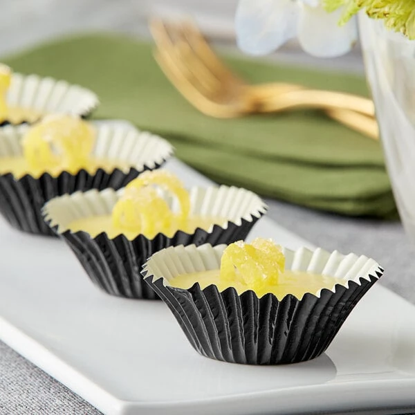 Enjay 1 1/4" x 7/8" Black Foil Mini Baking Cup - 10,080/Case