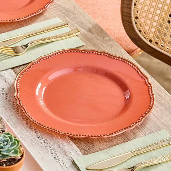 Visions Heirloom 10" Terra Cotta Round Plastic Plate with Gold Vintage Rim - 120/Case