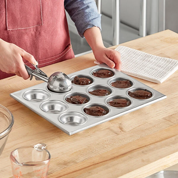 Choice 12 Cup 3.5 oz. Aluminum Muffin / Cupcake Pan - 14" x 11"