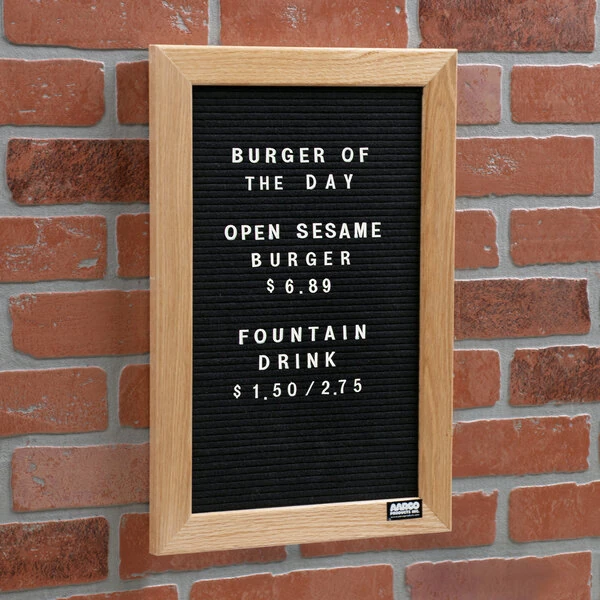 Aarco AOFD1812L 18" x 12" Black Felt Open Face Vertical Indoor Message Board with Oak Wood Frame and 3/4" Letters