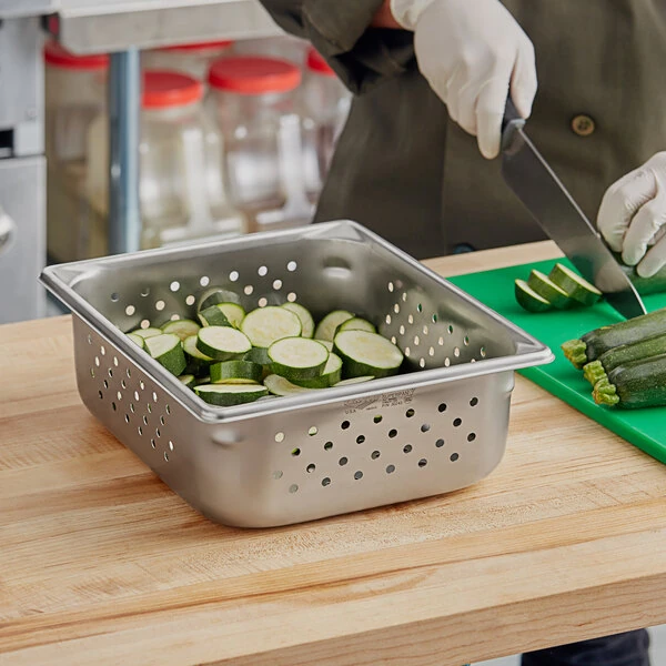Vollrath 30243 Super Pan V® 1/2 Size 4" Deep Anti-Jam Perforated Stainless Steel Steam Table / Hotel Pan - 22 Gauge