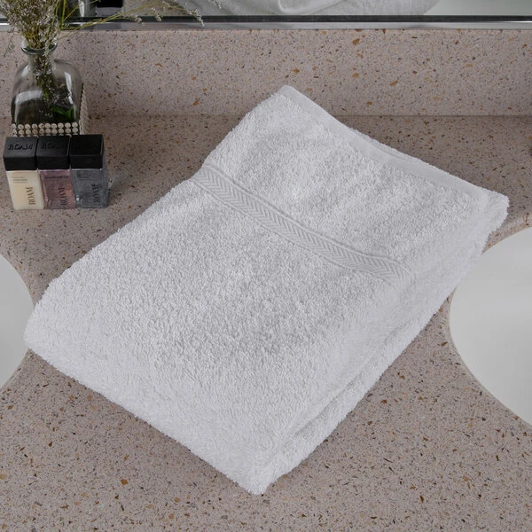 Oxford Gold Dobby 27" x 54" 86/14 Cotton Polyester Blend Bath Towel with Dobby Border 15 lb. - 48/Case