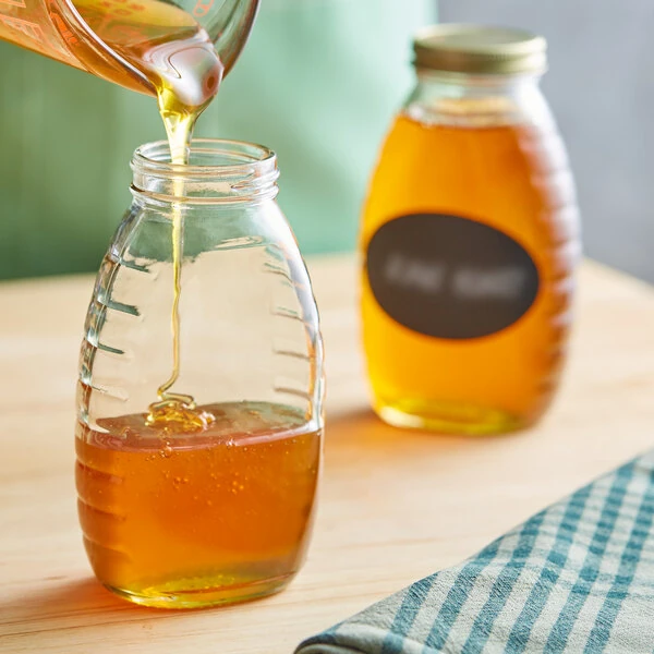 12 oz. (16 oz. Honey Weight) Classic Queenline Glass Honey Jar - 12/Case