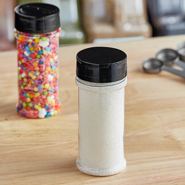 8.4 oz. Round Plastic Spice Container and 53/485 Black Induction-Lined Dual Flapper Lid with 7 Holes - 285/Case