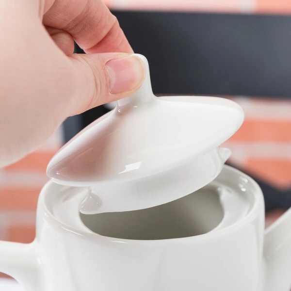 Tuxton AMU-101L Modena AlumaTux Pearl White (European White) China Coffee Pot Lid - 12/Case