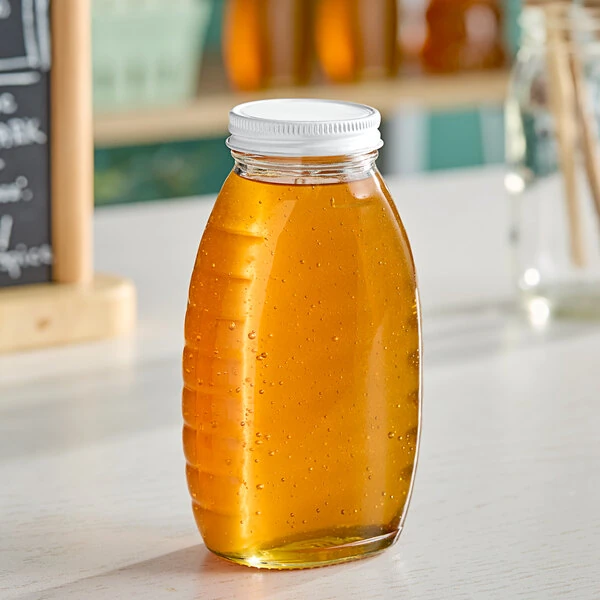 12 oz. (16 oz. Honey Weight) Classic Queenline Glass Honey Jar with Plastisol-Lined White Metal Lid - 96/Case
