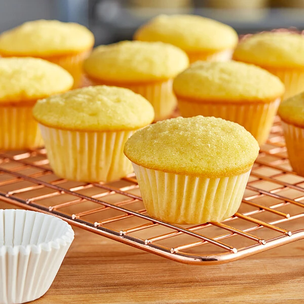 Wilton 1 1/2'' x 7/8'' White Mini Baking Cup - 100/Pack