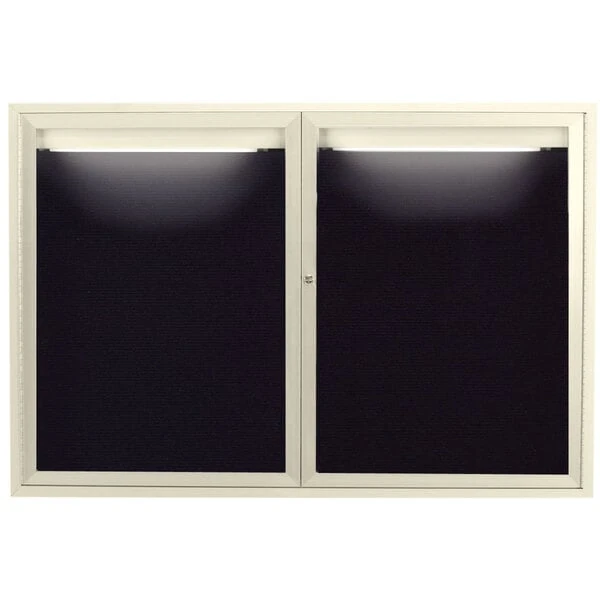 Aarco ADC4872IIV 48" x 72" Enclosed Hinged Locking 2 Door Powder Coated Ivory Aluminum Indoor Lighted Message Center with Black Letter Board