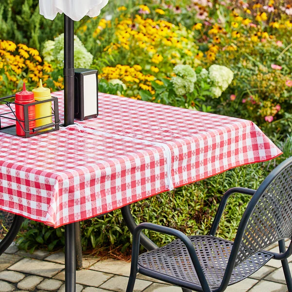 Choice 52" x 52" Red Textured Gingham Vinyl Table Cover with Umbrella Opening and Flannel Back