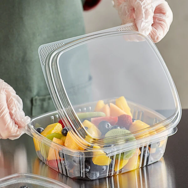 Choice 24 oz. Clear Recycled PET Tall Hinged Deli Container - 200/Case