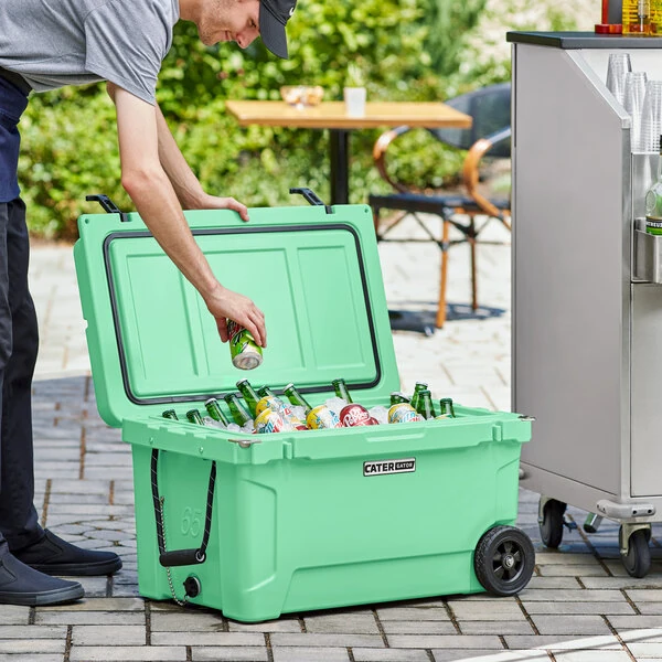 CaterGator CG65SFW Seafoam 65 Qt. Mobile Rotomolded Outdoor Cooler / Ice Chest