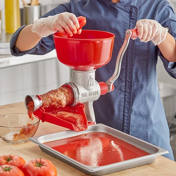 Tre Spade Red Stainless Steel Manual Tomato Squeezer with Plastic Bowl F10000