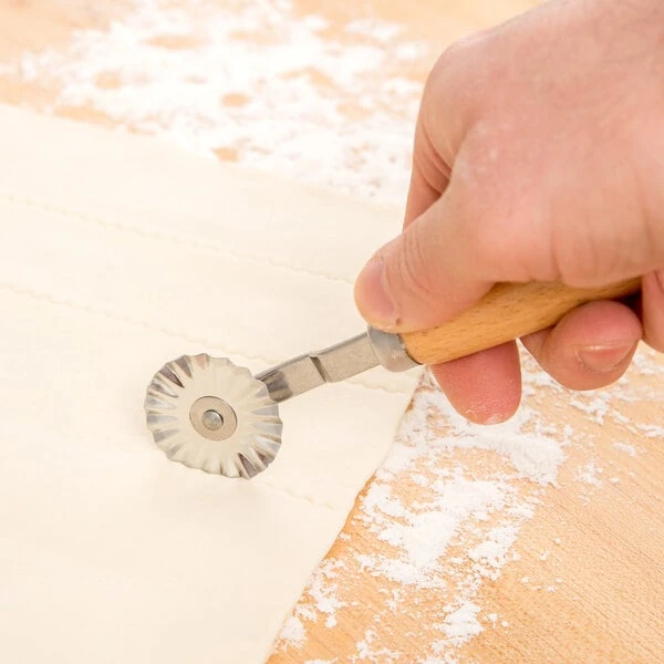 Ateco 1397 Stainless Steel Pastry Cutter with 1 3/8" Fluted Wheel and Wood Handle