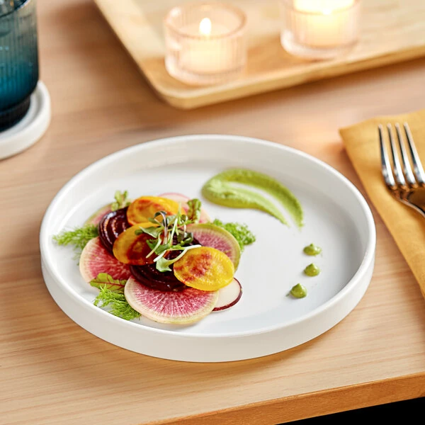 Acopa Lore 7 3/4 inch Bright White Raised Rim Porcelain Plate - Sample