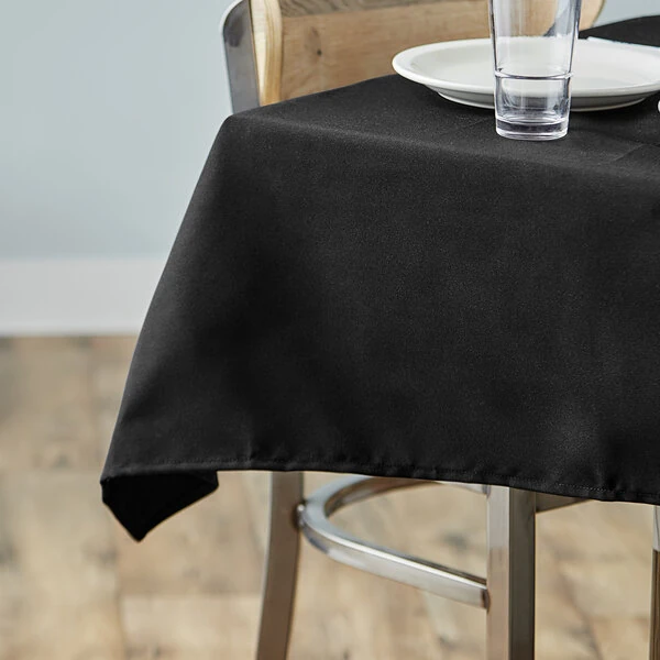 Choice 36" x 36" Square Black Seamless 100% Spun Polyester Hemmed Cloth Table Cover