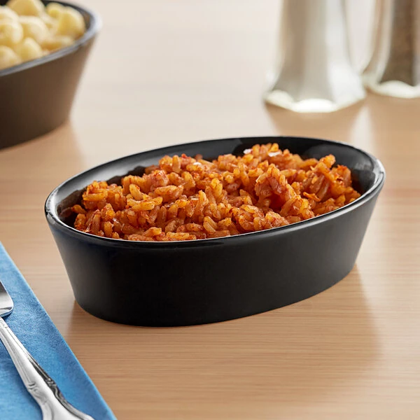 Acopa 7 oz. Black Oval Stoneware Baker Dish / Bowl - 12/Case