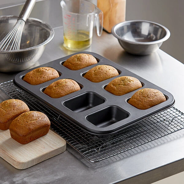 Baker's Lane 8 Compartment Non-Stick Carbon Steel Mini Bread Pan - 5 oz. Capacity, 3 5/8 inch x 2 3/8 inch x 1 3/8 inch Cavities