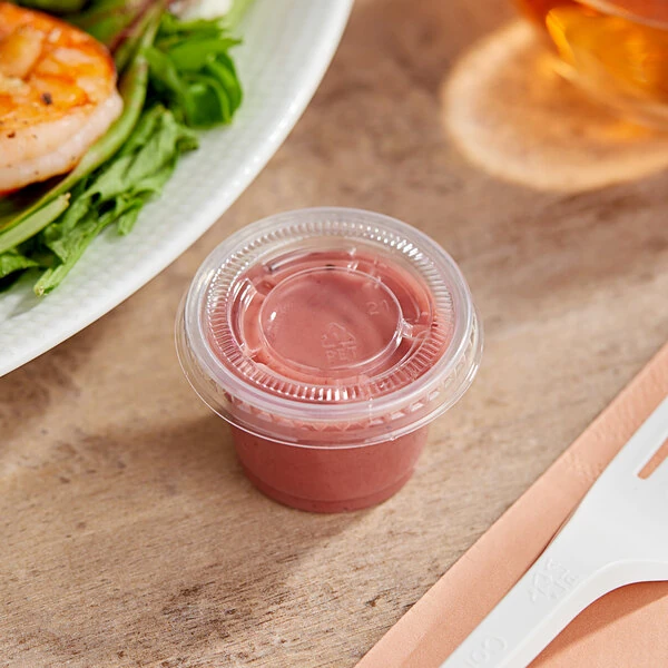 Choice 1 oz. Clear Plastic Souffle Cup / Portion Cup with PET Plastic Lid - 100/Case