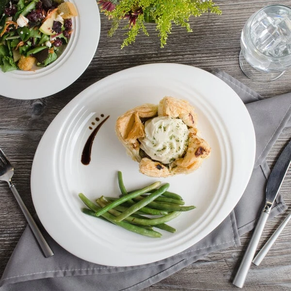 Bon Chef 1000018P Concentrics 12 7/8" x 10 3/8" White Porcelain Oval Dinner Plate - 12/Pack