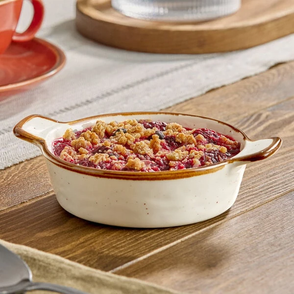 Acopa Keystone 6 oz. Vanilla Bean Porcelain Mini Casserole Dish with Handles - 48/Case