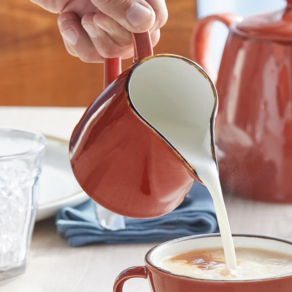 Acopa Keystone 10 oz. Sedona Orange Stoneware Creamer - 12/Case