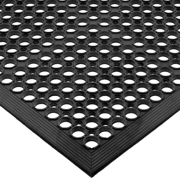 San Jamar KM1100B EZ-Mat 3' x 5' Black Grease-Resistant Bagged Floor Mat with Beveled Edge - 1/2" Thick