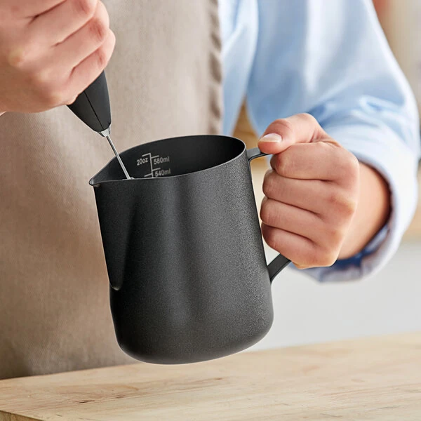 Acopa 20 oz. Black Frothing Pitcher with Measuring Lines
